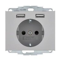 K.5 Gniazdo SCHUKO z gniazdem ładowania USB 2,4 A; samozaciski; stal szlachetna